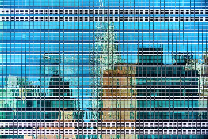 A photo of cityscape reflection on United Nations Building